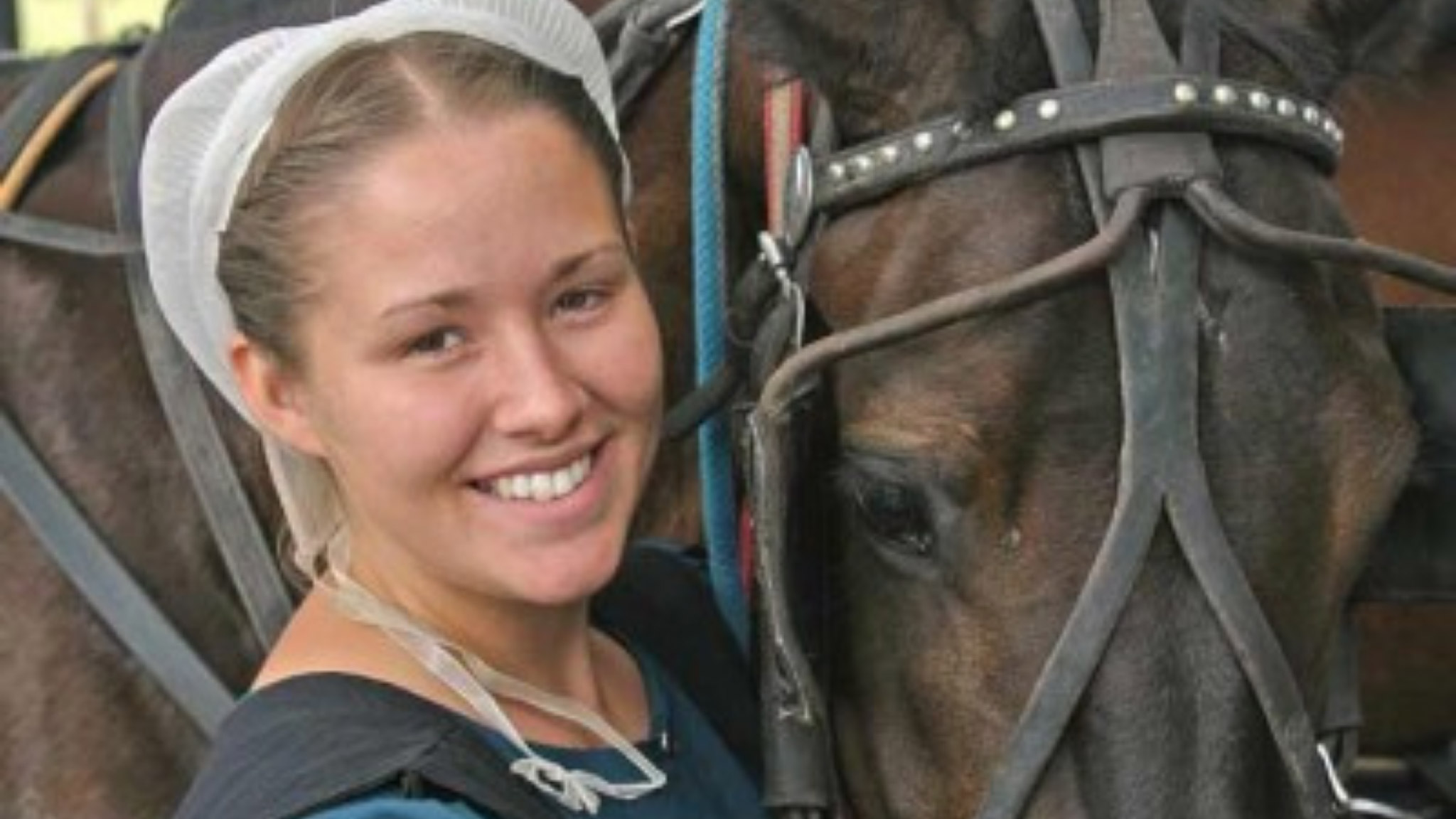 Miriam and horse at Aaron & Jessica's Buggy Rides in Bird-in-Hand PA